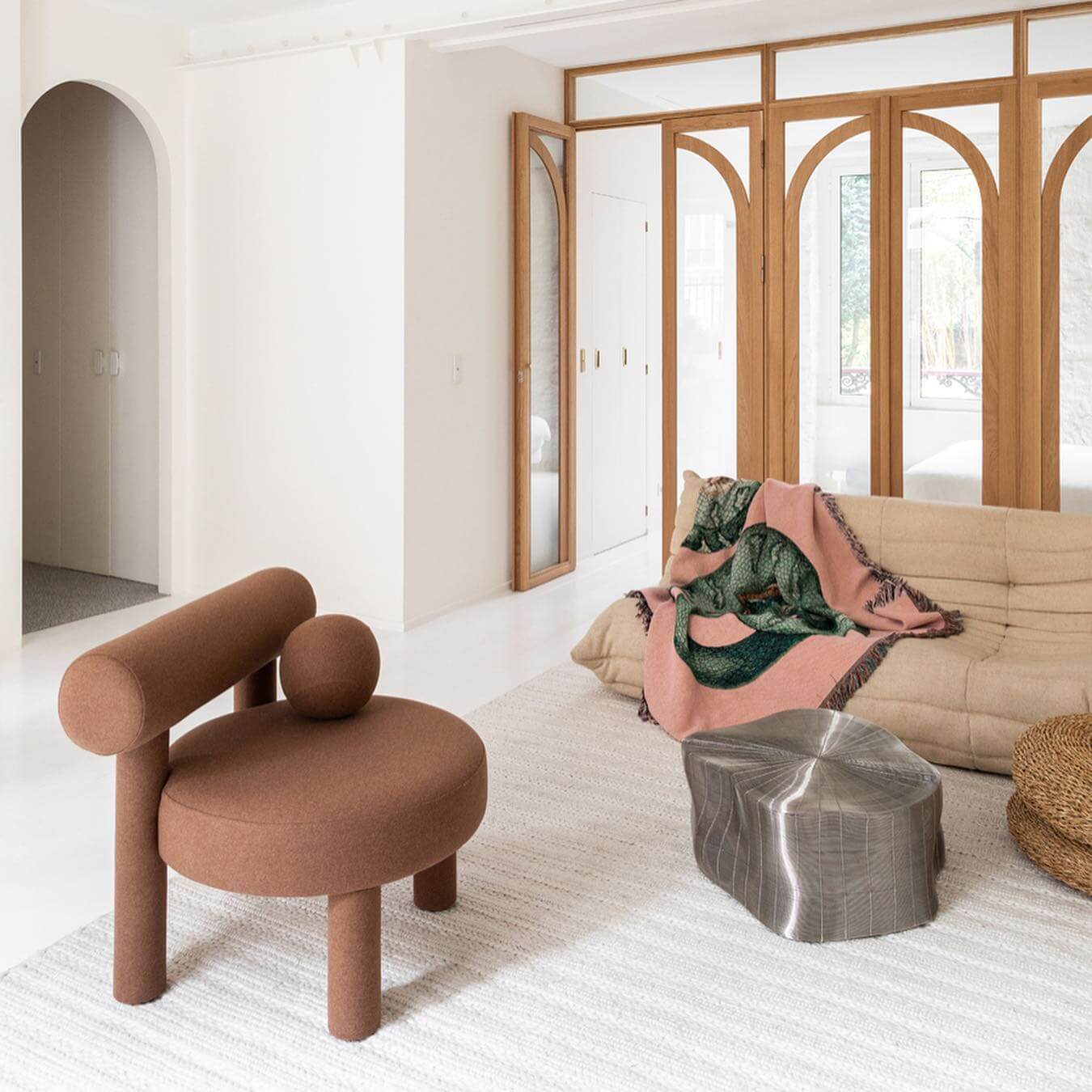 Modern living room featuring the Gropius Low Chair CS1 by Noom, Flock chair design, with minimalist Bauhaus-inspired decor.
