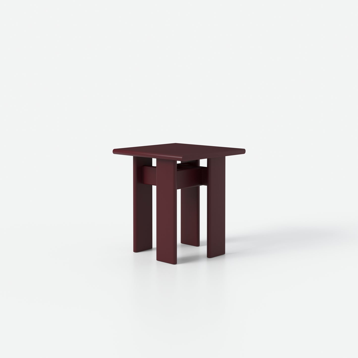 Archipen Table 1 in deep maroon color, a modern unique side table with a compact, architectural design by Noom.