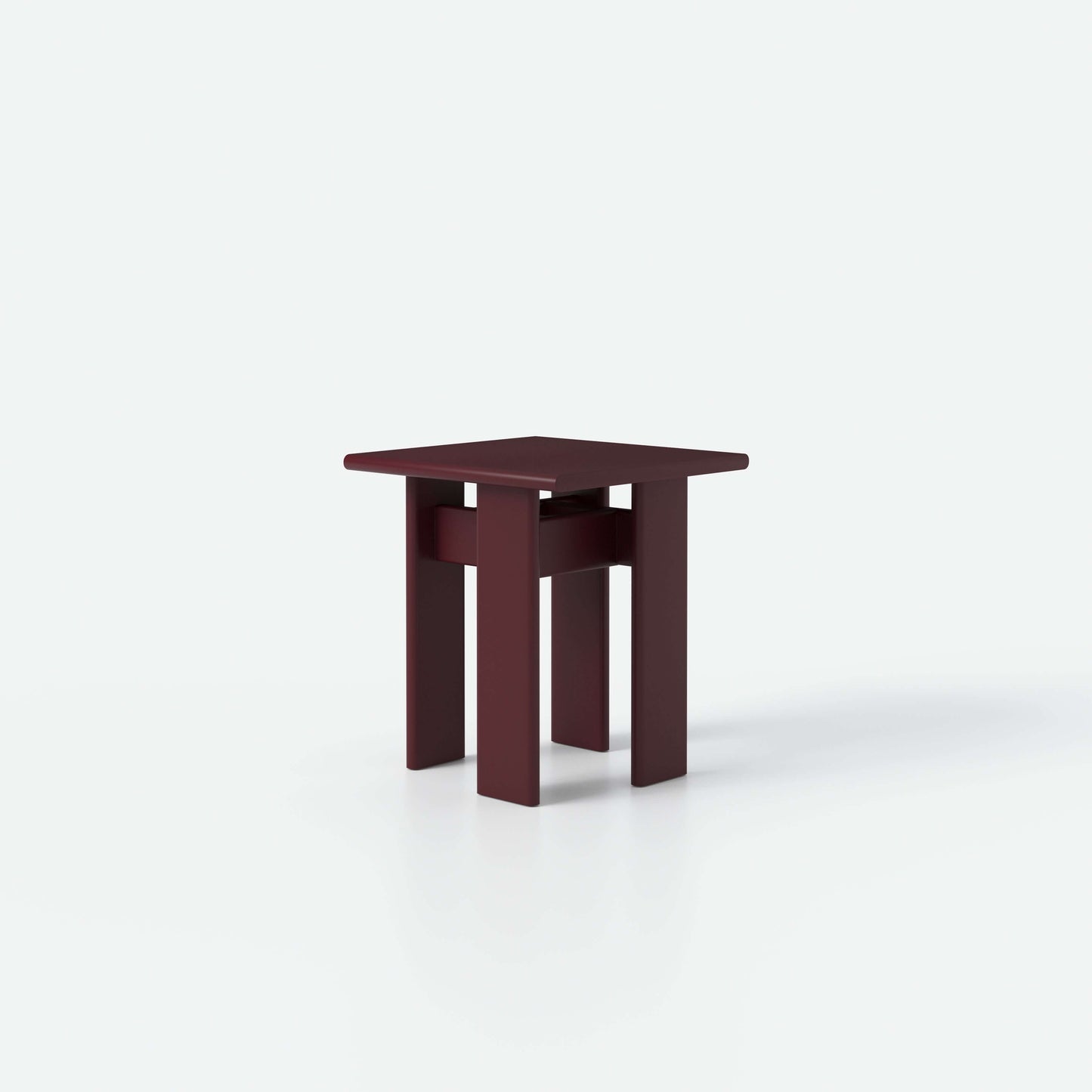 Archipen Table 1 in deep maroon color, a modern unique side table with a compact, architectural design by Noom.