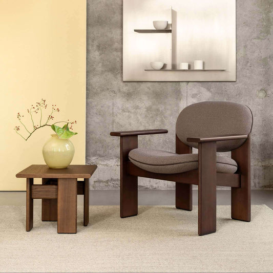 Archipen Lounge Chair in a modern interior setting, featuring unique ash wood and a sculptural design by Noom.