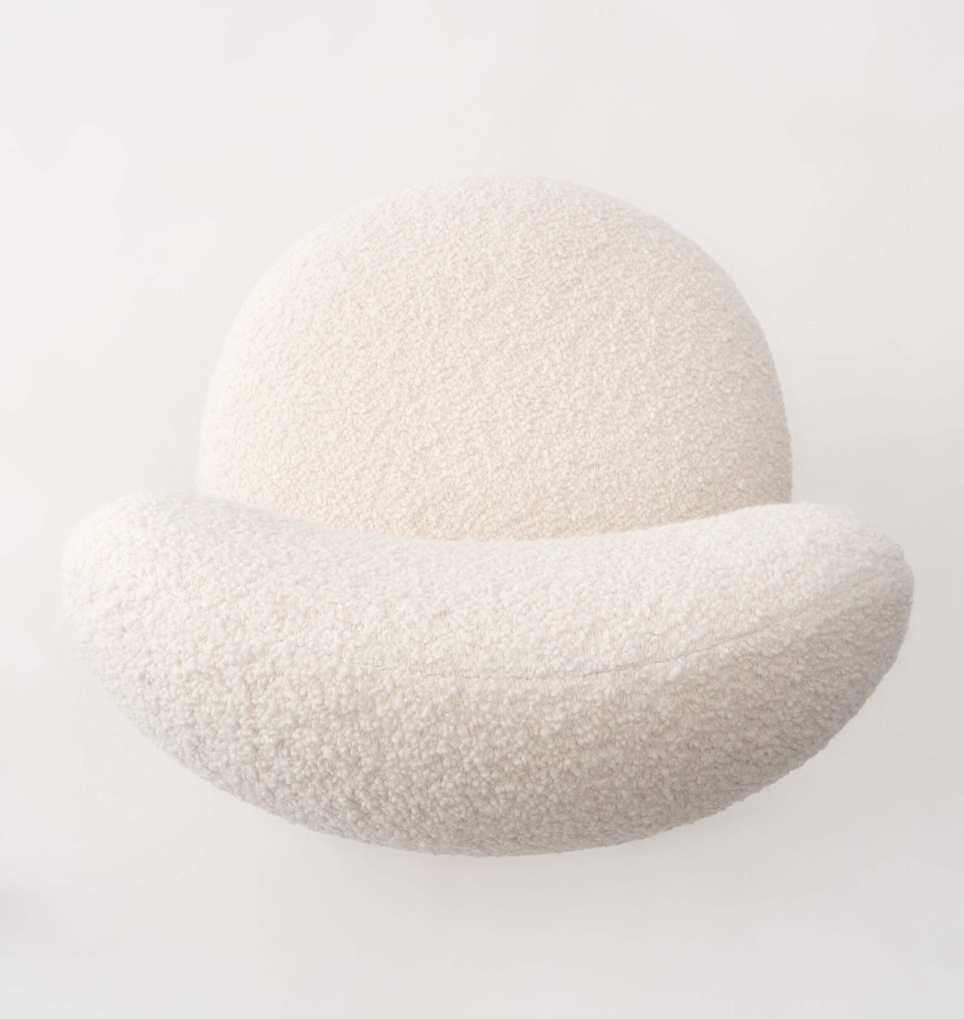 Modern designer flock dining chair by NOOM, featuring plush, soft upholstery in a minimalist design.