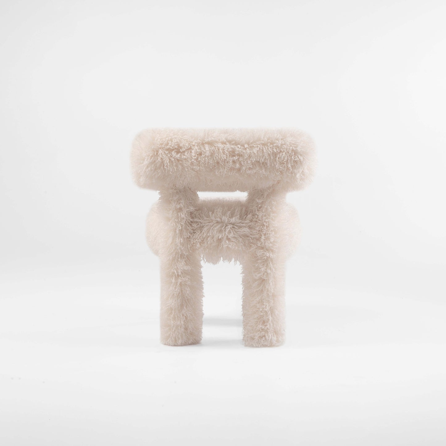 Gropius Dining Chair CS1 Fluffy Edition by Noom covered entirely in white faux fur fabric, showcasing design by Kateryna Sokolova, perfect for modern interiors
