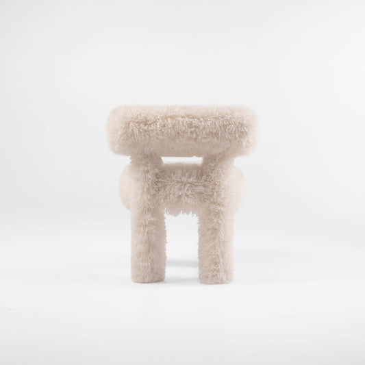 Gropius Dining Chair CS1 Fluffy Edition by Noom covered entirely in white faux fur fabric, showcasing design by Kateryna Sokolova, perfect for modern interiors