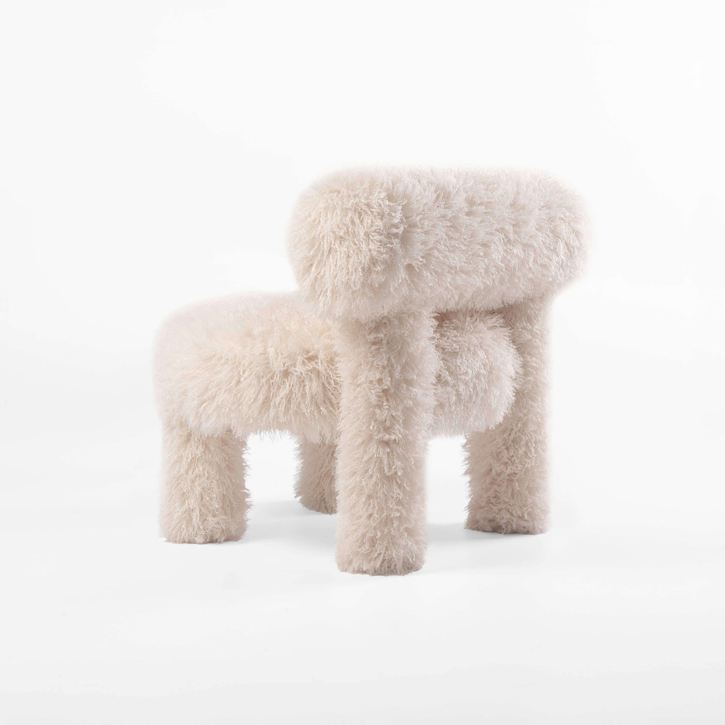 Noom Gropius Low Chair CS1 in white faux fur full fabric, comfy modern design inspired by Bauhaus, by Kateryna Sokolova.