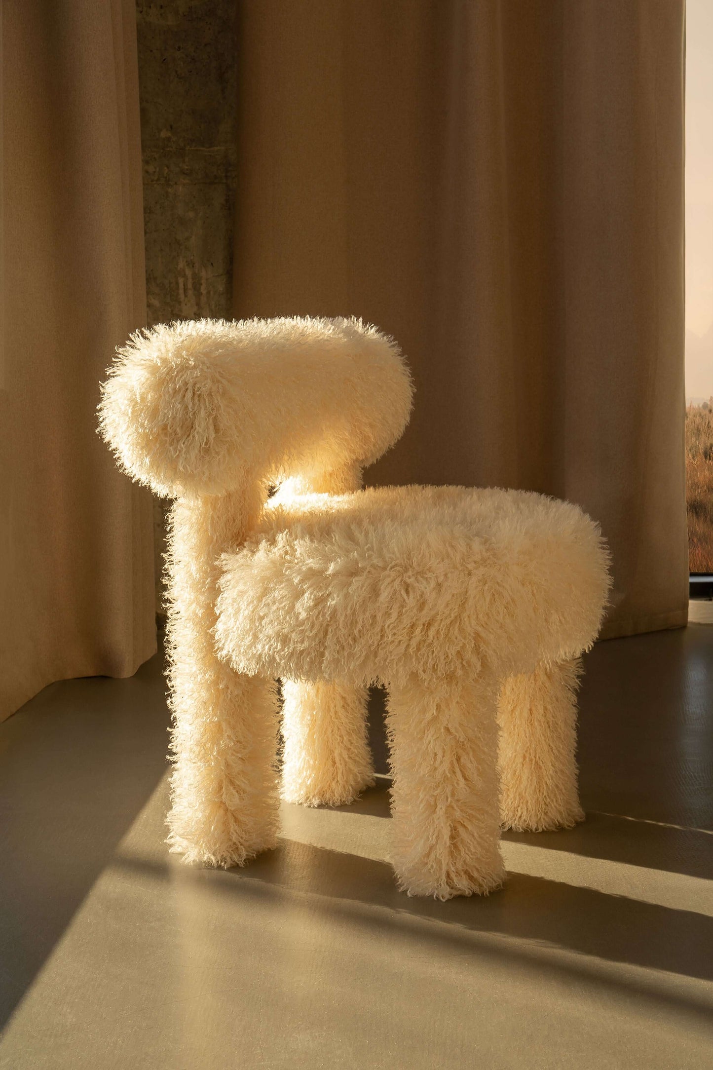 Gropius CS1 Fluffy Edition chair by Noom, designed by Kateryna Sokolova, in a sunlit room with a stylish, plush texture.
