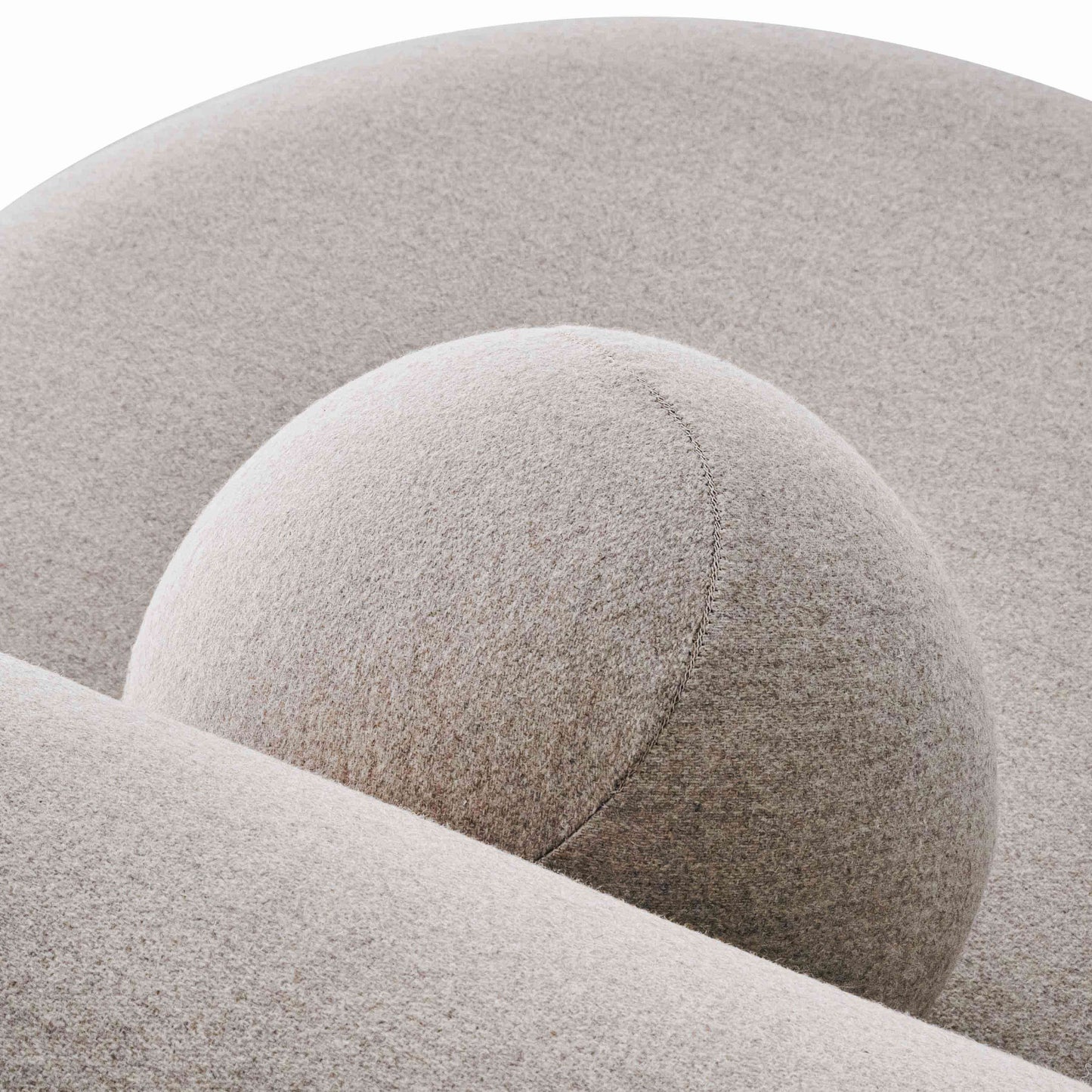 Close-up of Gropius Low Chair CS1 by Noom, showcasing modern Bauhaus-inspired geometric design in soft, textured fabric.