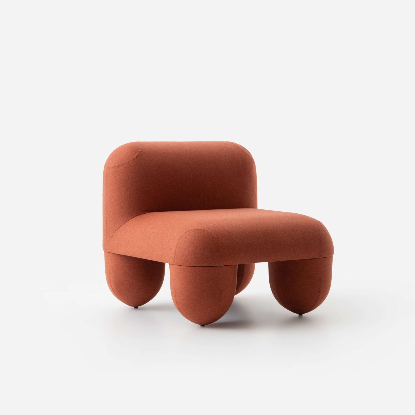 HELLO Low Chair by Noom, designed by Denys Sokolov, featuring playful round shapes and deep seating from the Gropius furniture collection.