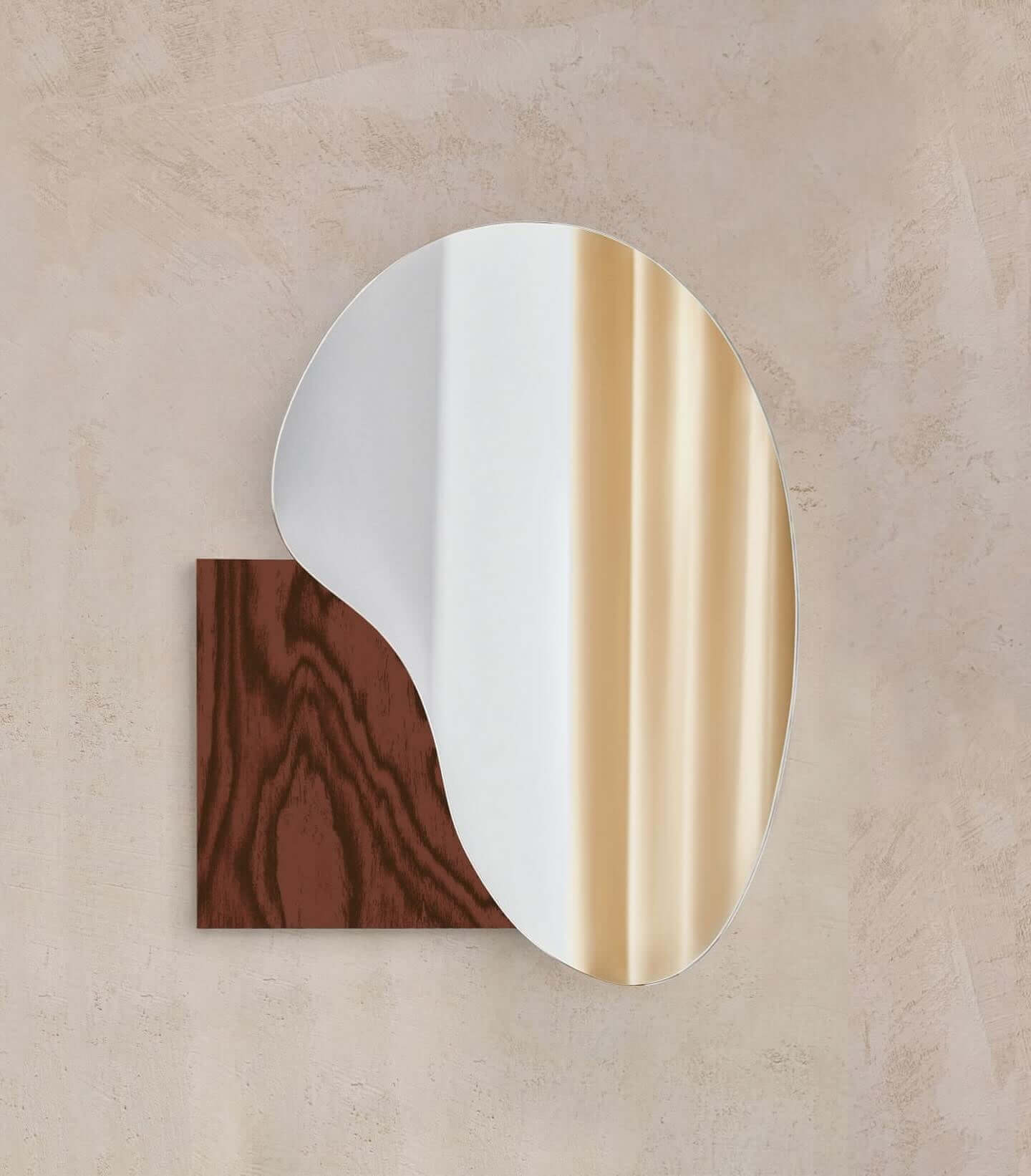 Irregular lake-shaped mirror by Noom with Sottsass veneer, featuring fluid glass design and contrasting materials.