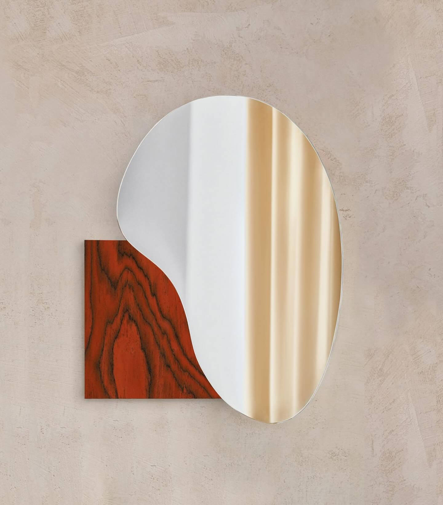 Sculptural irregular lake mirror with Sottsass veneer, stainless steel, and marble options by Noom Home, inspired by nature's fluid shapes.