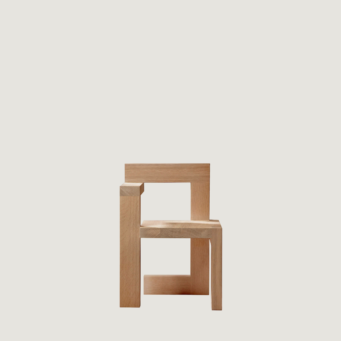 Wooden Steltman chair designed by Gerrit Rietveld for Spectrum, showcasing modernist design and craftsmanship.