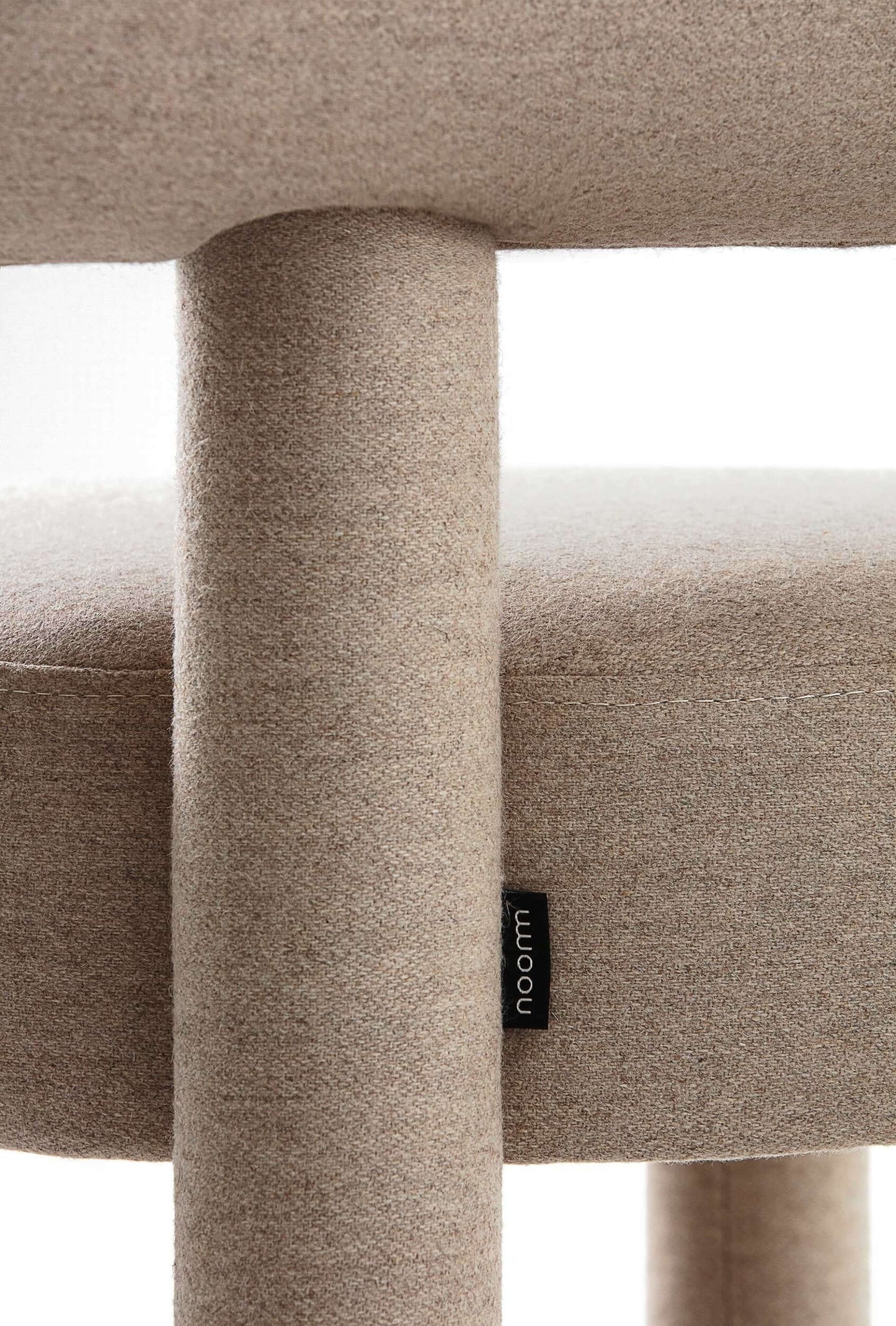 Close-up of Gropius CS1 Bar Stool detail showcasing cylindrical shape and fabric texture, designed by Kateryna Sokolova for Noom