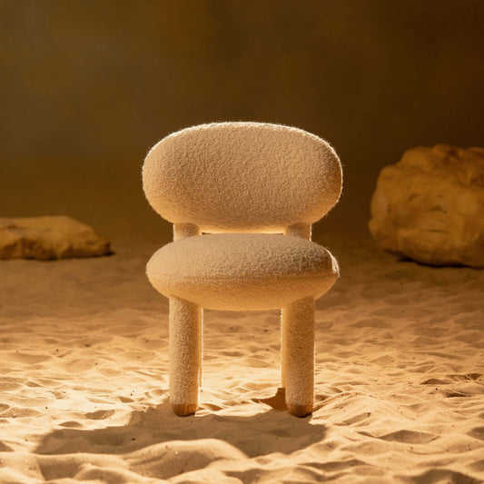 Modern designer Flock dining chair by NOOM home, featuring soft, voluptuous forms and a cozy texture.