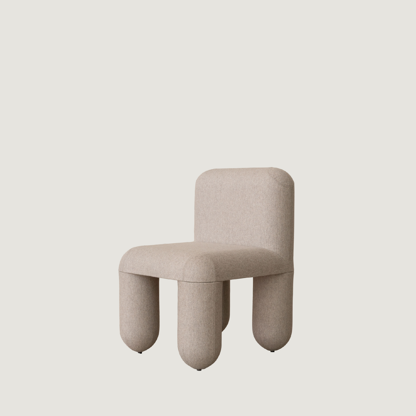 Flock chair by Noom, designed by Denys Sokolov, featuring round organic shapes and a comfortable seat for home use.